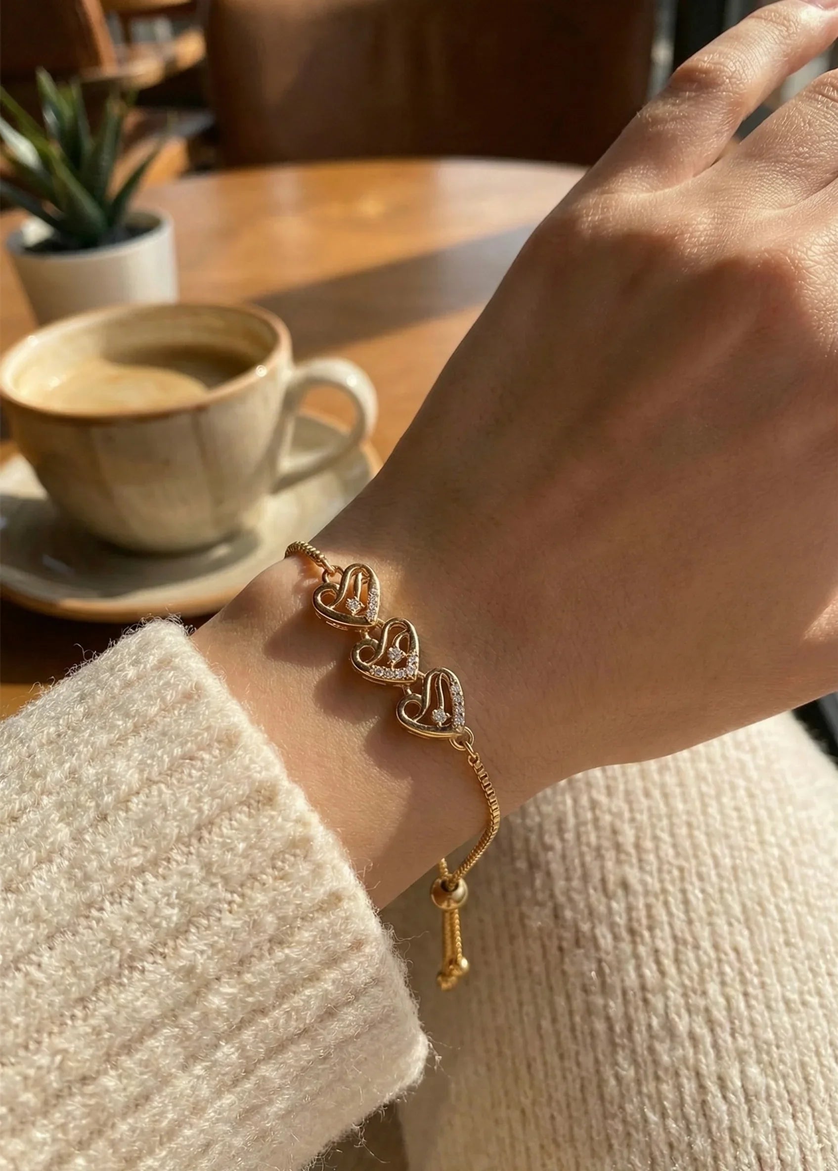 Astra Jewels Golden Triple Heart Crystal Adjustable Bracelet for Women