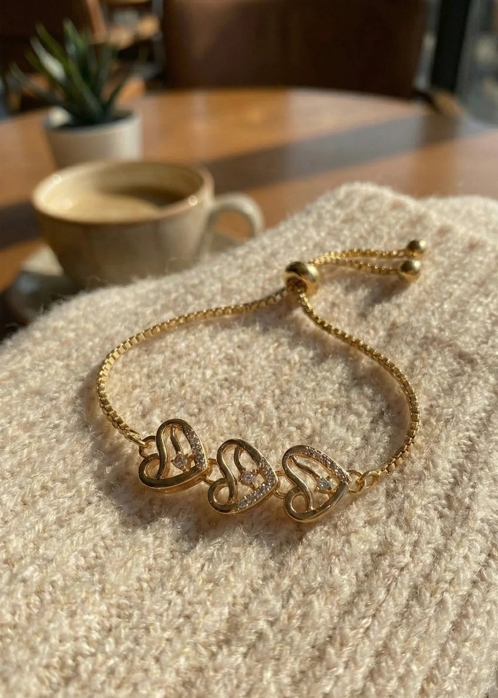 Astra Jewels Golden Triple Heart Crystal Adjustable Bracelet for Women